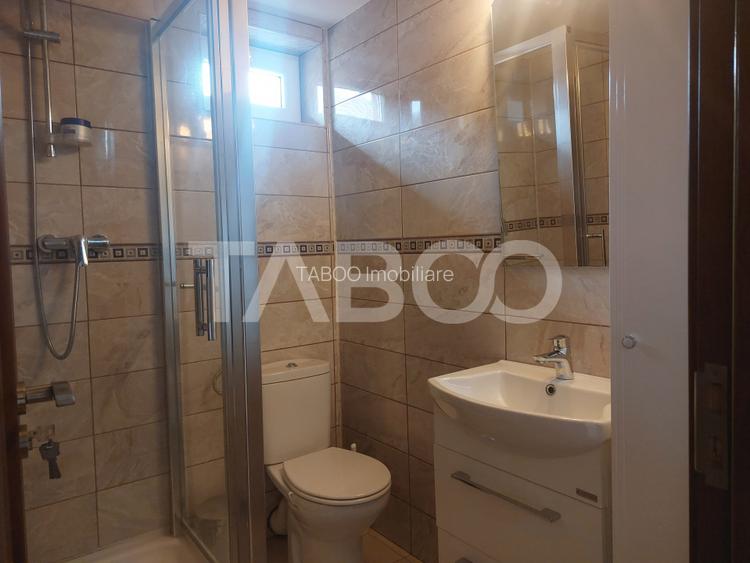 Casa in zona centrala 5 camere 2 bucatarii 3 bai curte comuna Cisnadie - 10
