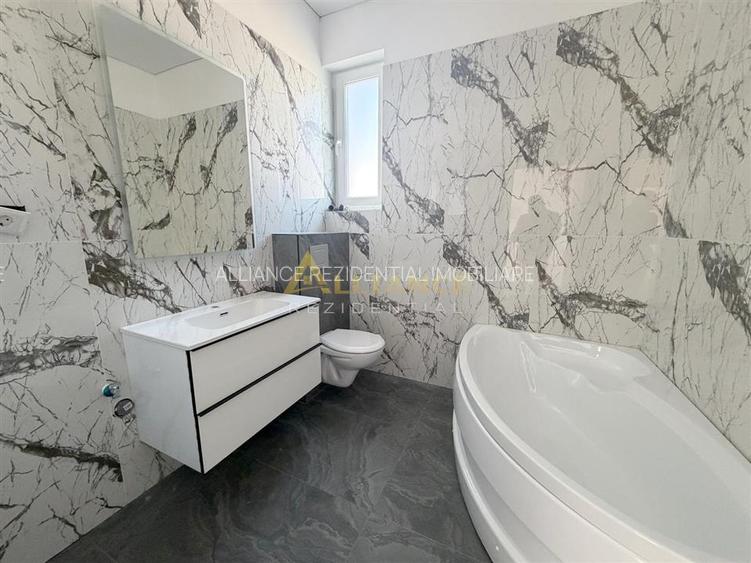 Casa individuală parter - 4 camere - 2 băi + dressing - teren 371mp - 6