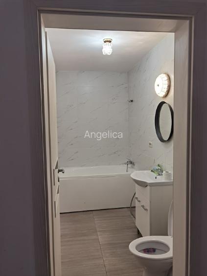 Garsoniera 35mp cu curte 23mp, loc parcare inclus in fata portii - 7