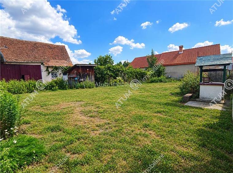 Casa cu 4 camere si 1650 mp teren la doar 30 km distanta de Sibiu - 2