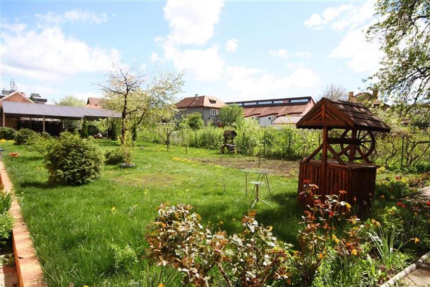Apartament central cu acces la gradina si 2 locuri parcare