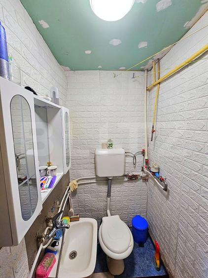 Casă cu 2 camere, curte proprie și garaj
