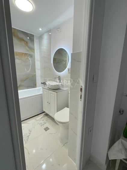 Garsonieră renovată integral în zona Farmec The Office. - 8