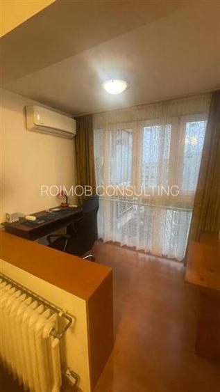 Dristor, garsoniera luminoasa in bloc mixt - 9