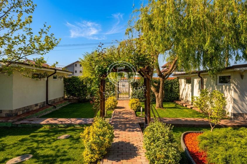 Casa cu probabil cea mai frumoasă grădină din Bragadiru + 2 garaje - 29