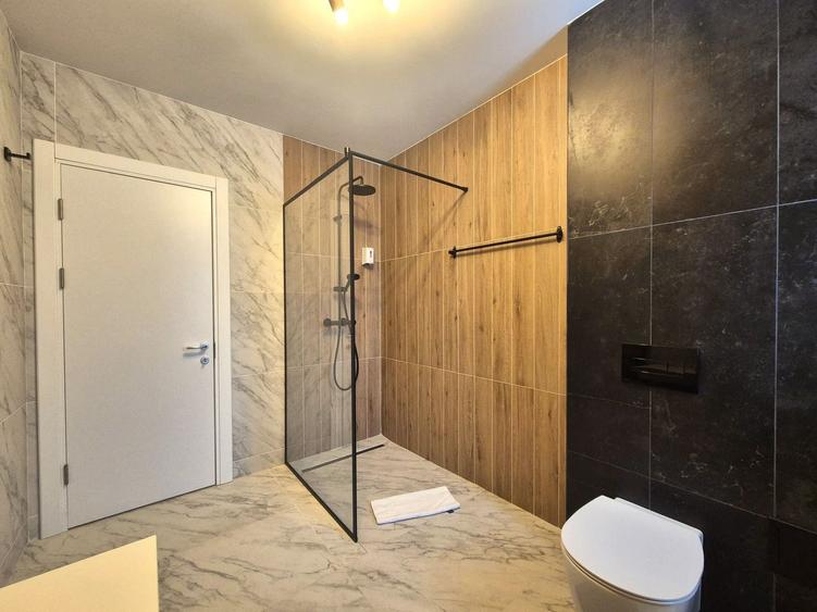 Apartamente în vilă construite în 2024, cu priveliște spre Postăvaru.