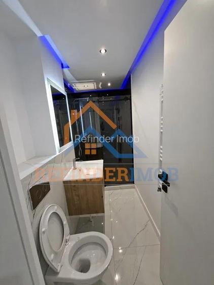 Garsoniera renovata  Aparatorii Patriei - Metrou etaj 1 bloc din 1986 - 8