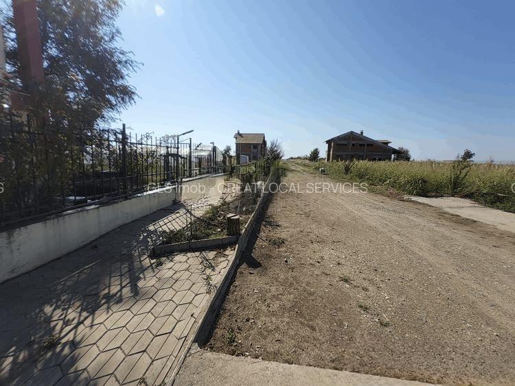 Frumusani-Pasarea '70 loturi cu drum intr-o zona in dezvoltare  - 2