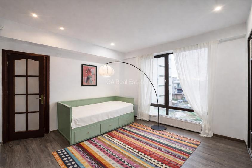 Un apartament ca o casa cu terasa generoasa si doua locuri de parcare - 9