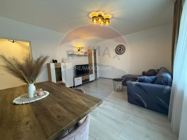 Apartament cu 3 camere, 2 bai și loc de parcare - 56