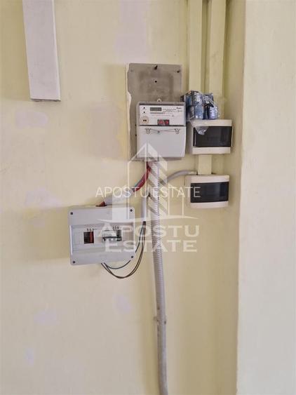 Casa familiala cu spatiu comercial si garaj P+1E+M 720 Mp - 56