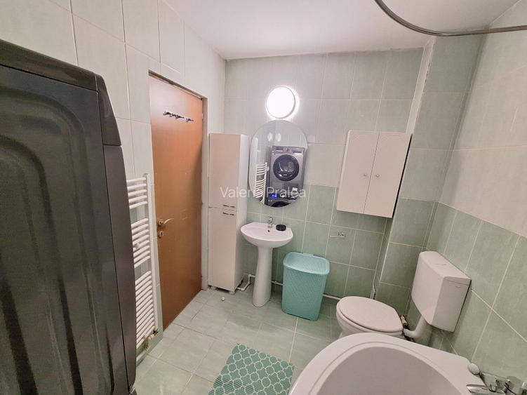 Închiriez apartament spatios cu 2 camere,parter,zona Calea Moldovei,parcare incl - 6