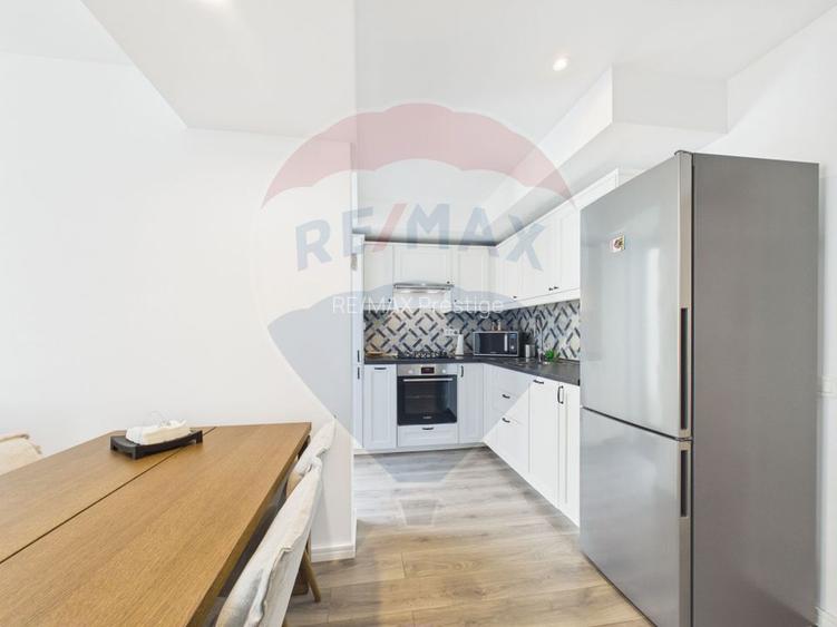 Apartament la parter ce are curte proprie ,  2 camere in Bloc nou - 15