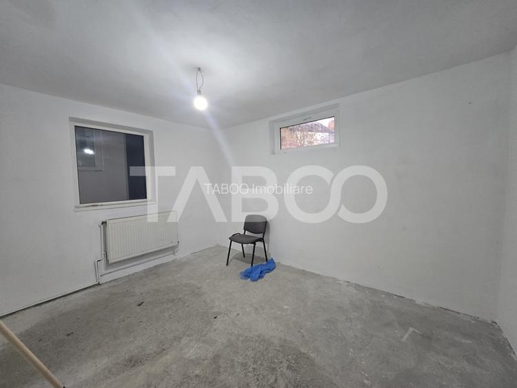 Casa individuala de vanzare 54mpu curte propie 69mp zona Central Sibiu - 4