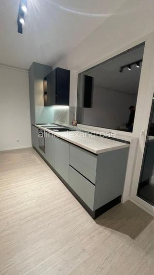 Garsoniera + 1 loc parcare 100000 euro - 2