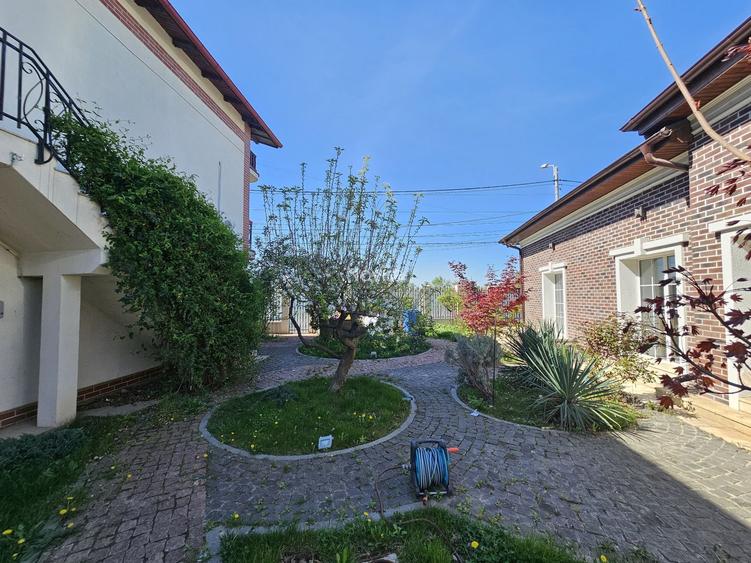 Casă spațioasă de închiriat cu curte amenajată și facilități complete - 2