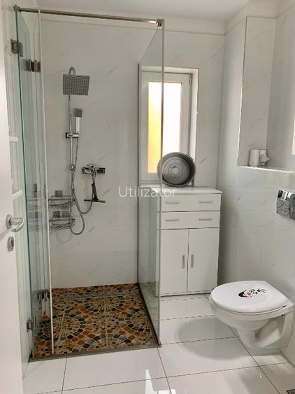Ofer spre închiriere apartament cu 3 camere - 11