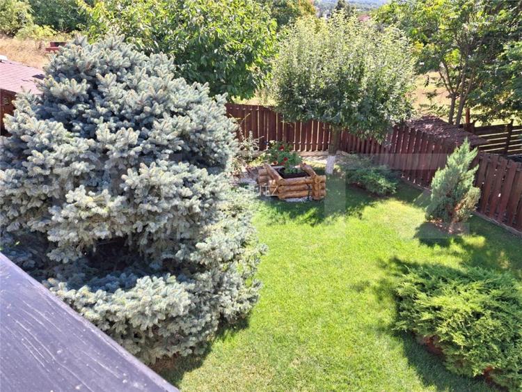 Proprietate eleganta cu teren mare si garaj in Bucium, perfecta pentru familie - 14