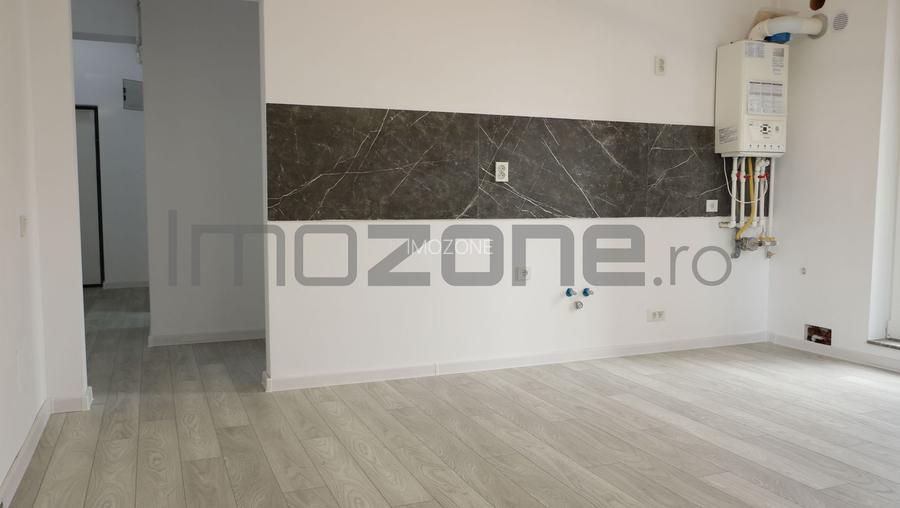 3 CAMERE LA PARTER CU CURTE PROPRIE DE 57MP,  2 BAI, POZITIE PE SUD, COMISION 0% - 9