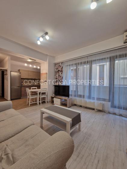 ASE -  Romana - Dorobanti - nou - 2 camere - mobilat modern - centrala termica - 3