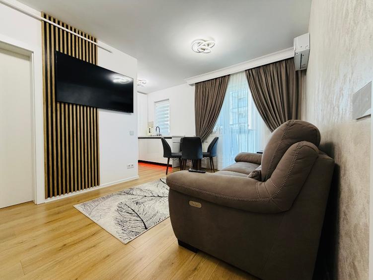 Apartament 2 camere + grădină proprie 70 mp + 2 locuri de parcare