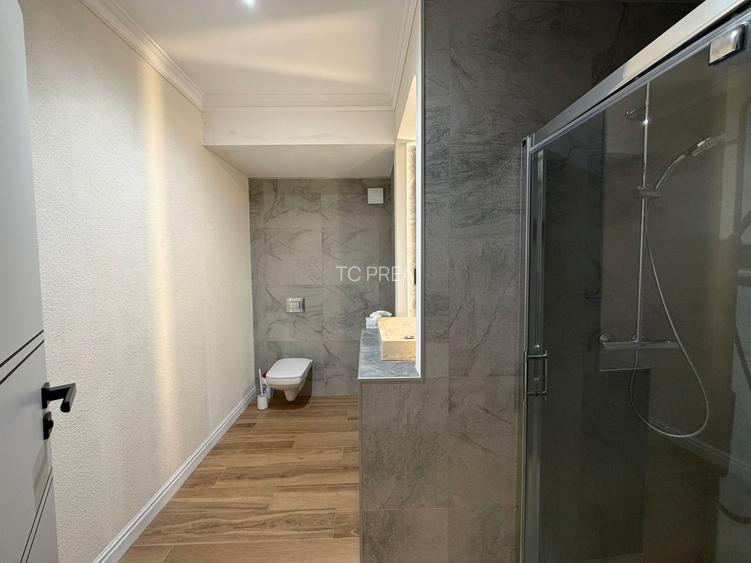 Apartament cu 2 camere, situat pe Calea Victoriei nr. 128, una dintre cele mai p - 13