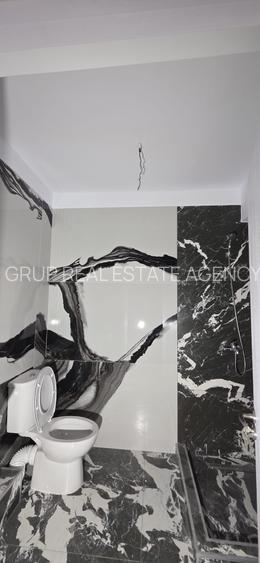 Apartament  cu balcon, demisol – construcție nouă-acces strada principala - 7