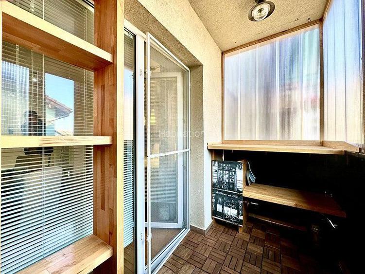 Apartament generos -curte proprie - garaj - 33