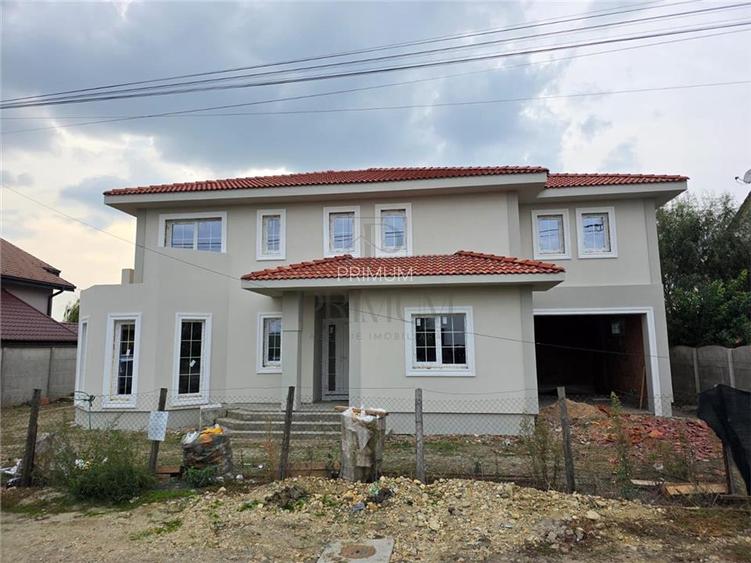 Casa individuala - teren 730 mp - garaj - 5 dormitoare - living 57 mp - 2