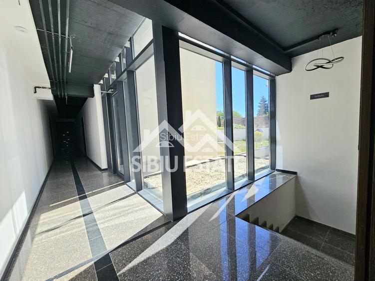 Apartament Sibiu central 3 camere, 2bai, lift garaj NOU - 13