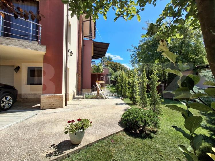 Proprietate eleganta cu teren mare si garaj in Bucium, perfecta pentru familie - 13