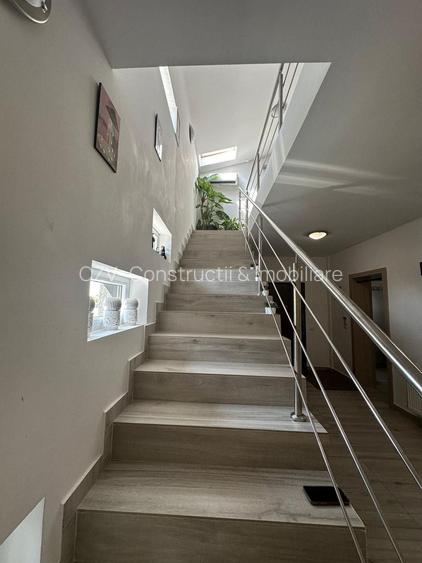 Vila individuală P+1, 5 camere, 260 mp utili – teren 400 mp - 31