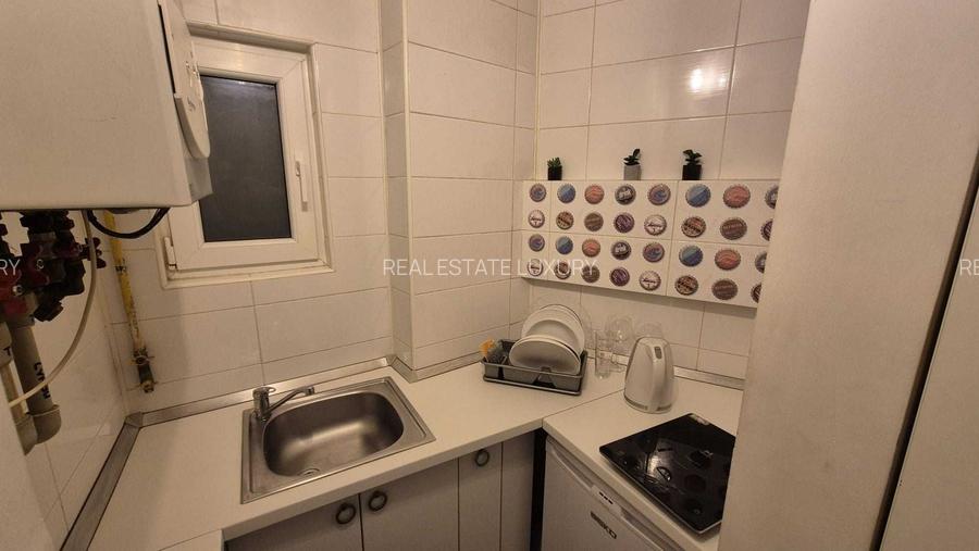 🏙️✨ Garsonieră spațioasă de închiriat – Piața Romană - 4