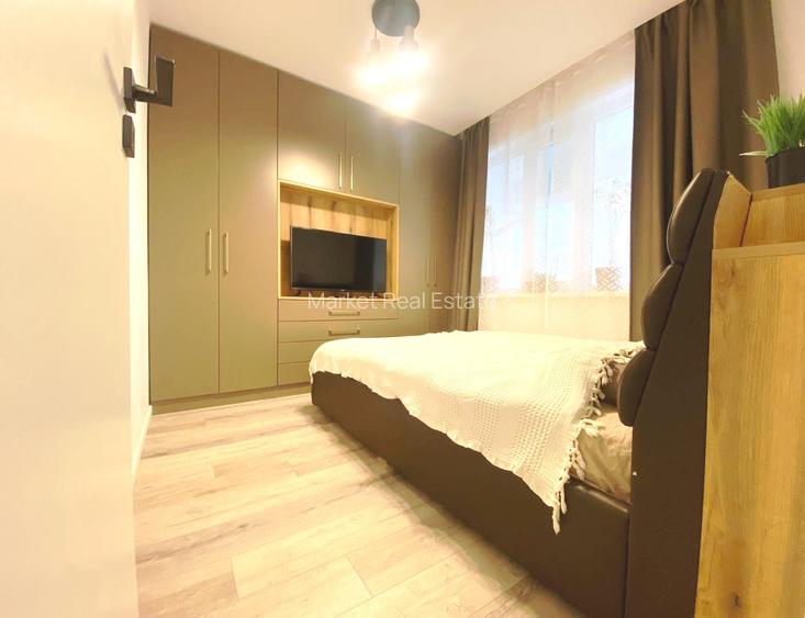 Apartament 3 camere/2 bai + curte proprie 79m2 + 2 parcari - 4