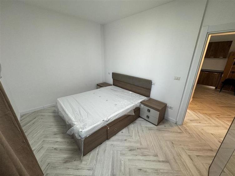 Ap 2 cam,parter,parcare, bloc nou, Scoala 2 - Piata Moldovei