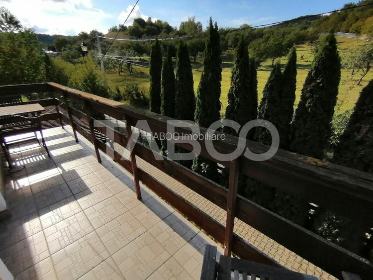 Pensiune 13 camere 16 bai sauna piscina si teren 1565 mp Cisnadioara - 33