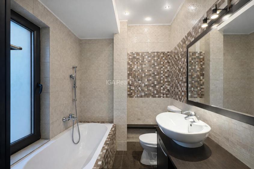 Un apartament ca o casa cu terasa generoasa si doua locuri de parcare - 11