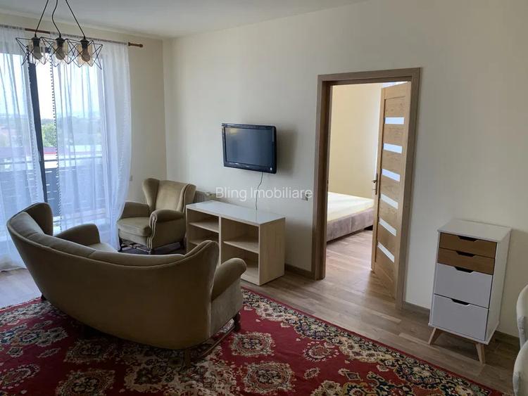 Apartament cu 3 camere, 56 mp, balcon, zona Centrala Gilau - 2