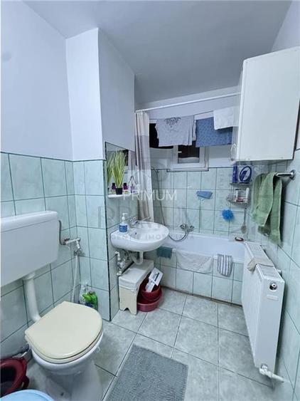 BUZIASULUI - ETAJ 1 - BLOC IZOLAT - 3 CAMERE - 2 BAI - 2 BALCOANE - CENTRALA PRO - 7