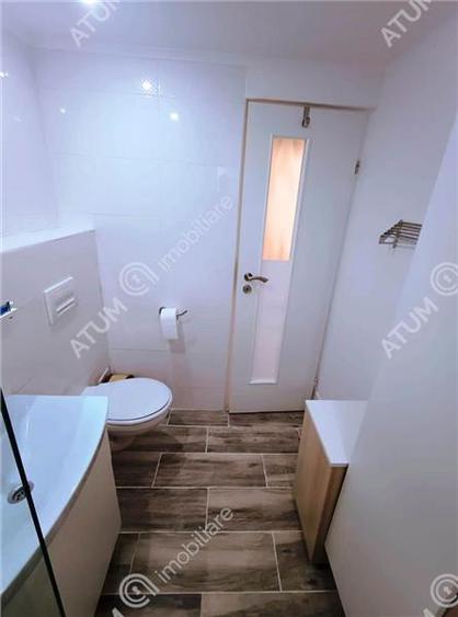 Apartament renovat cu 3 camere 2 bai si pivnita in Sibiu