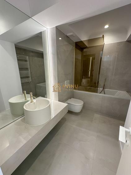 Inchiriere 2 camere cortina north cu loc de parcare suprateran inclus