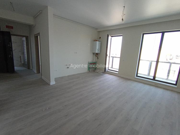 Exclusiv - Apartamente finalizate 2 camere și 3 camere -Loc parcare - 10