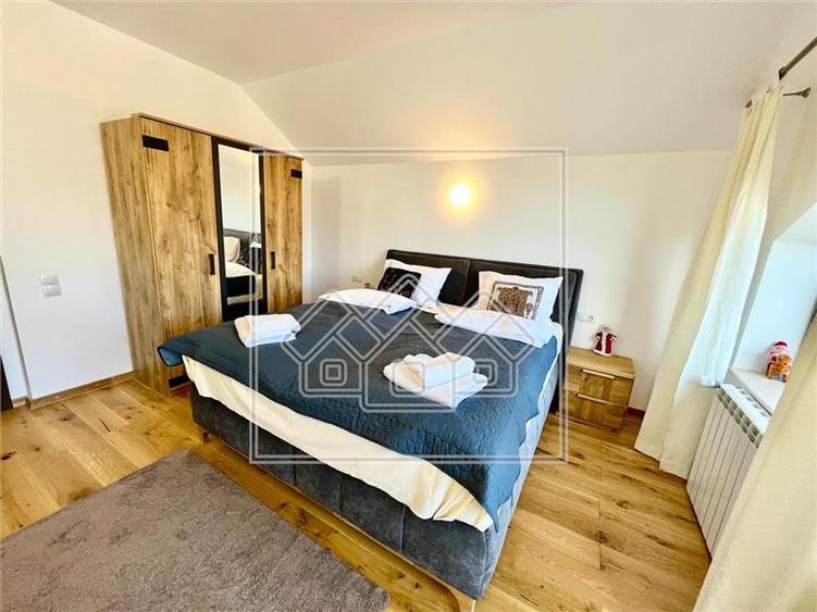 Casa de vanzare in Cisnadioara - 450 mp utili, garaj, teren 900 mp