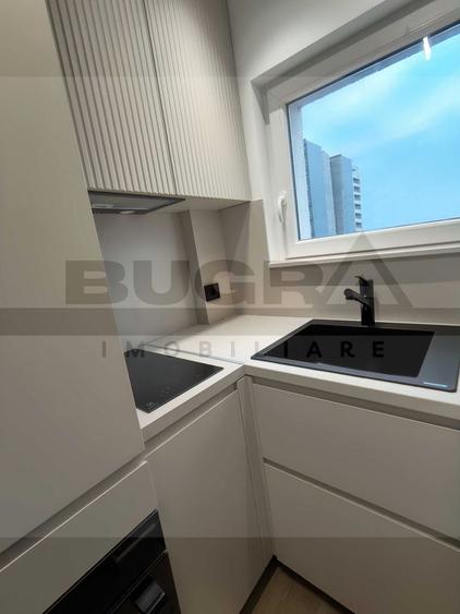 Garsoniera lux, 28mp, balcon, etaj intermediar, parcare, zona centrala