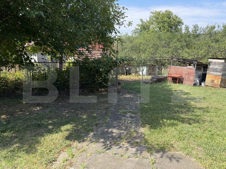 Casă cu 4 camere, 100 mp, teren 2500 mp, zona Garcei