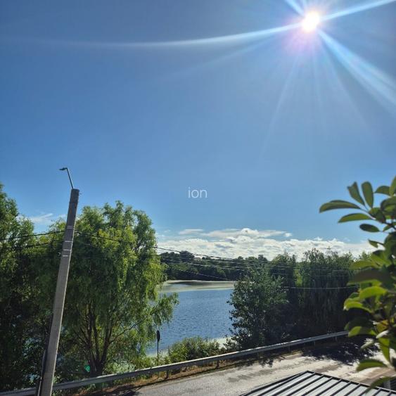 Casa 5 camere, 3 bai, 3 locuri de parcare, teren 302 mp, Tunari, vedere la lac - 13