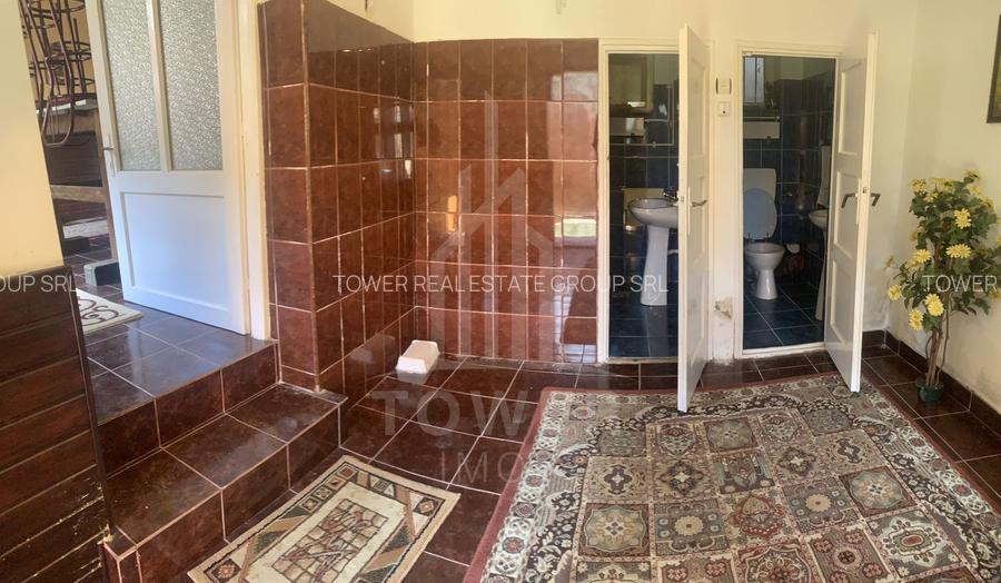 Casă în centrul Cisnădioarei cu 243mp de locuit și teren de 936mp - 27