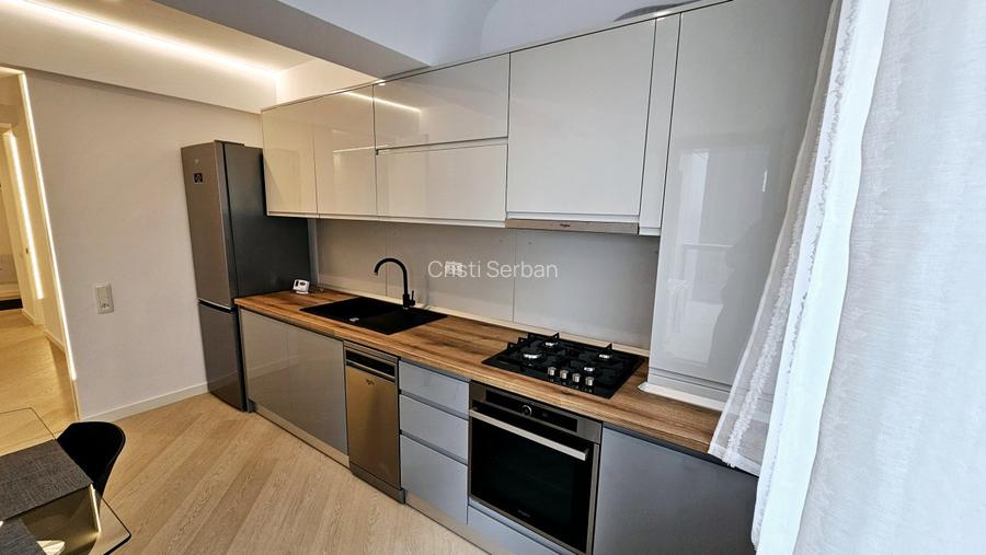 Ofer spre inchiriere apartament 3 camere decomandat plus loc parcare subteran - 4