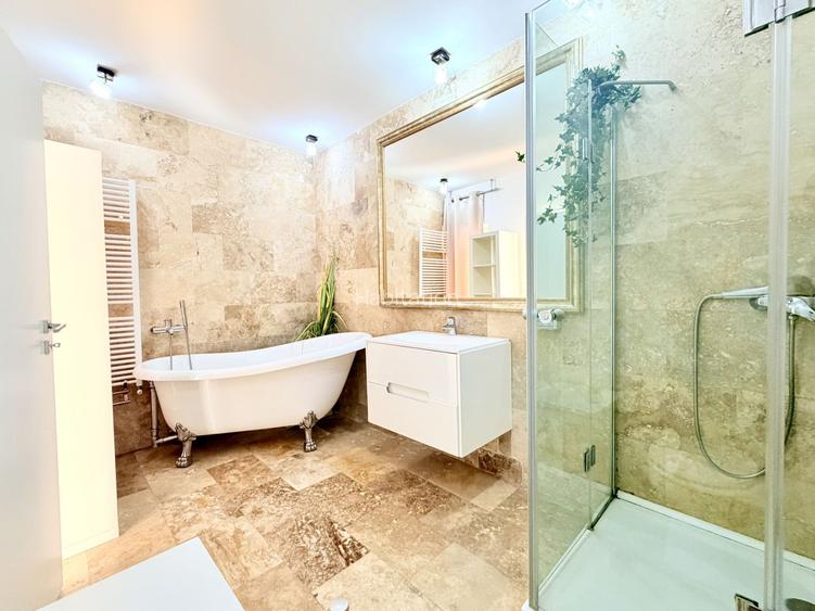 Apartament generos -curte proprie - garaj - 18