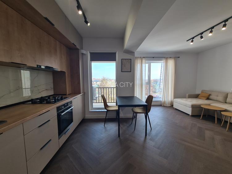 Apartament luminos,  zona  buna, bine compartimentat, mobilat, prima inchirere. - 16